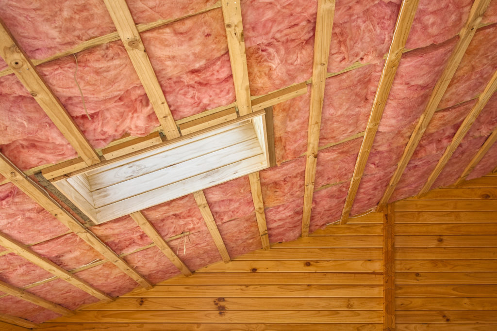 Fiberglass batt insulation between ceiling rafters
